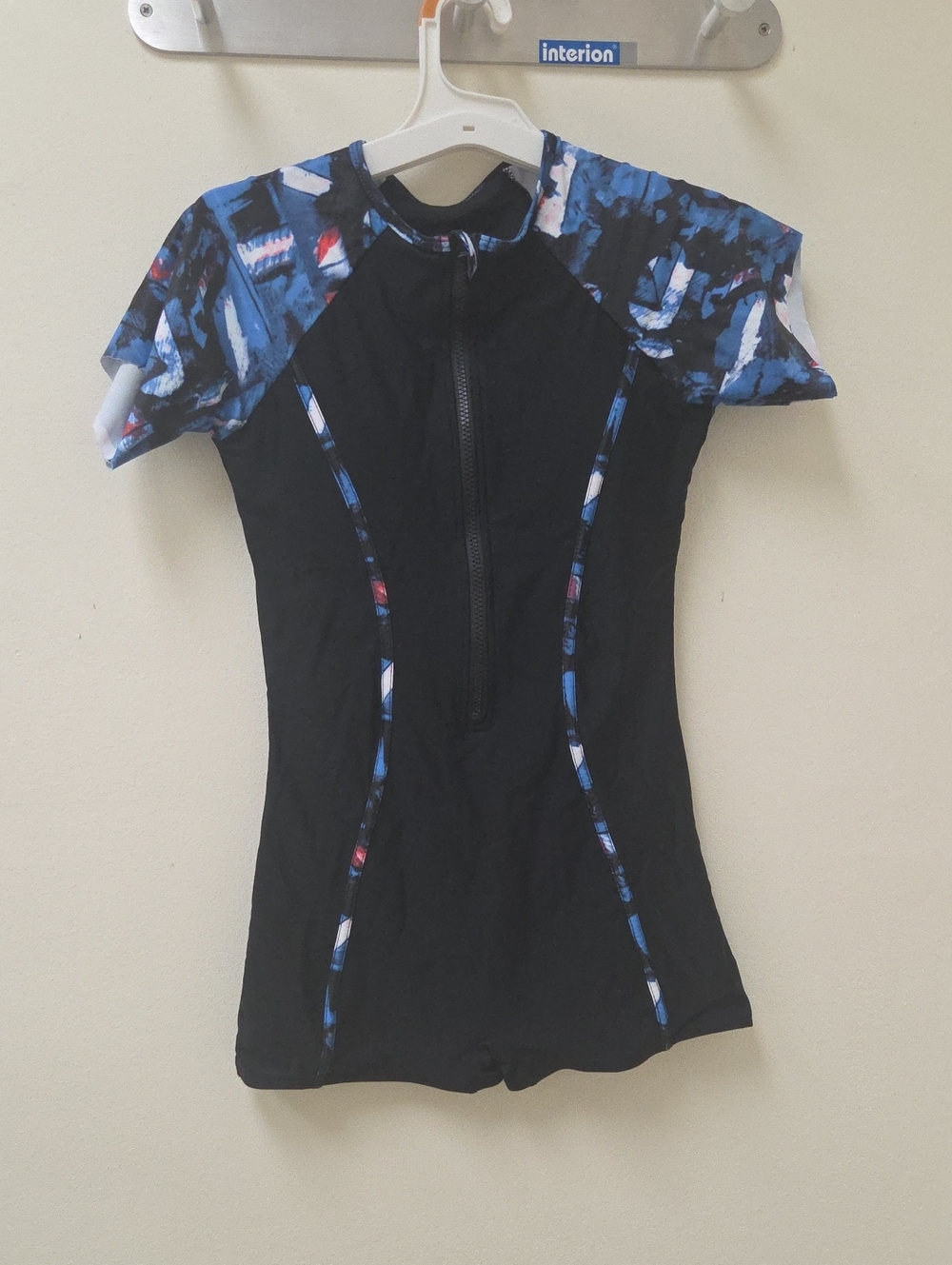 Women’s Black Short-Sleeve Zip Front Swimsuit with Blue Print Accents